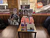 A table at Dongrae Milmyeon marking where RM had sat when he visited with a sign and various photos. [JIN EUN-SOO]