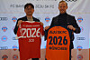 Jo Ja-ryong, CEO of Jeju SK FC. left, and Rouven Kasper, a Bayern Munich board member in charge of marketing and sales, pose with commemorative uniforms on April 10 after signing a deal to hold a summer friendly between the two clubs on Jeju Island in this photo provided by Jeju SK FC. [YONHAP]