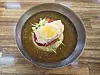 A bowl of milmyeon (cold wheat noodles) at Dongrae Milmyeon, known to have been visited by BTS's RM [JIN EUN-SOO]