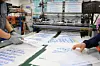 Workers are seen at a plastics factory manufacturing standard plastic garbage bags in Seo District, Incheon, on April 3. [YONHAP]