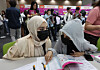 Foreign students seeking jobs crowd the venue during an employment fair for international students at Exhibition Hall 2 of Bexco in Haeundae District, Busan, on Aug. 19, 2025. [JOONGANG ILBO]