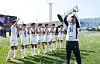 Ri Yu-il, coach of North Korea’s Naegohyang Women’s FC, lifts the trophy after his team wins the AFC Women’s Champions League final against Tokyo Verdy Beleza at Suwon Sports Complex in Gyeonggi on May 23. [NEWS1]