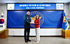 The head of Louis Vuitton's global intellectual property department, Valérie Sonnier, right, poses with the chief of police at the Seoul Seongbuk Police Precinct in northern Seoul on April 23. [SEOUL SEONGBUK POLICE STATION]