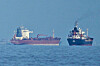 Oil tankers and cargo ships navigate the Strait of Hormuz. [AP/YONHAP]