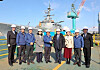 Lee Myung-ku, the commissioner of the Korea Customs Service, fourth from right, is seen posing for a photo with representatives from the shipbuilding industry at the HD Hyundai Heavy Industries shipyard in Ulsan on March 12. [YONHAP]