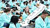 A contest participant shows a piece she wrote in Korean during a Korean traditional calligraphy writing competition at Gwanghwamun Square in central Seoul, on Oct. 9, 2025. [NEWS1]