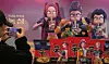 Visitors take photos in front of a display featuring characters eating ramyeon from the Netflix animated film “KPop Demon Hunters” at a festival in Gumi, North Gyeongsang, on Nov. 7, 2025. [NEWS1]