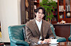 Actor Yoo Yeon-seok talks with Sejong University officials at the university's President's Office [SEJONG UNIVERSITY]