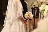 A bride enters a wedding hall. [YONHAP]