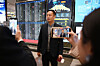 A Chinese business traveler speaks to the media after checking in for a flight to Pyongyang at Beijing Capital Airport on March 30. [AFP/YONHAP]
