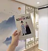 Jale Azizova holds up an Azerbaijani book that teaches beginner-level learners about the Test of Proficiency in Korean, which she herself made after studying for the exam. [SCREEN CAPTURE]