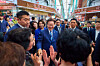President Lee Jae Myung, center, meets with local merchants at Namhang Market in Busan on May 27. [BLUE HOUSE]