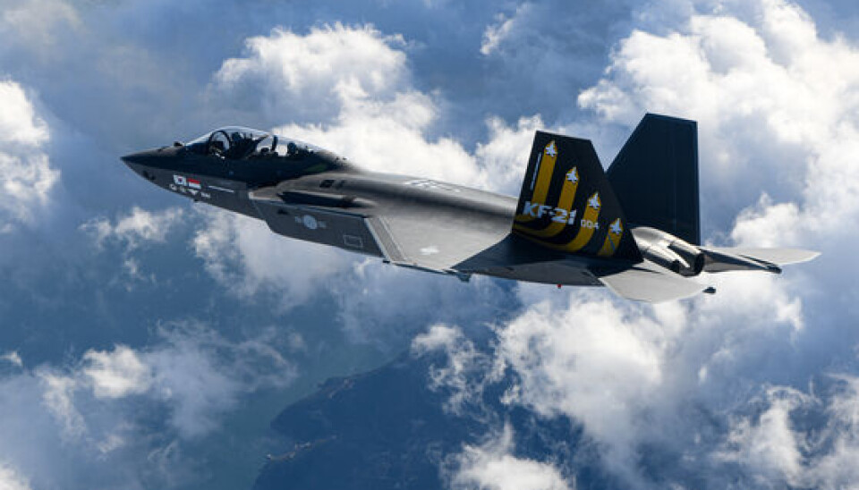 KF-21 Boramae fighter jet flying above clouds during a test flight.