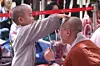 A child novice monk, left, touches a monk’s head during a ceremony at Jogye Temple in Jongno District, central Seoul, on April 22, 2019. [JOONGANG ILBO]