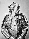 A 1875 portrait of a Japanese samurai with a 'chonmage,' a type of traditional topknot haircut in which only the top of the head was shaved [GETTY IMAGES PRO]