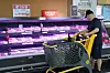 A man looks at pork displayed at a supermarket in Seoul on June 2. [YONHAP]