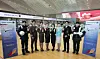 Asiana Airlines and Korean Air flight and cabin crew employees pose for a commemorative photo at Incheon International Airport Terminal 2 on May 14 to mark Asiana Airlines’ relocation to Terminal 2 on Jan. 14 [JOONGANG ILBO]
