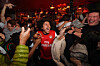 Arsenal supporters celebrate in a pub near the Emirates Stadium after the club won the Premier League title in London on May 19. [AP/YONHAP]
