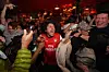 Arsenal supporters celebrate in a pub near the Emirates Stadium after the club won the Premier League title in London on May 19. [AP/YONHAP]