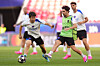 Lee Kang-in of the Paris Saint-Germain, left, vies for the ball with Vitinha during a training session ahead of the Champions League final soccer match between Paris Saint-Germain and Arsenal in Budapest, Hungary on May 29. [AP PHOTO/YONHAP]