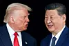 U.S. President Donald Trump, left, and Chinese President Xi Jinping talk as they leave after a bilateral meeting at Gimhae International Airport, on the sidelines of the APEC summit, in Busan on Oct. 30, 2025. [REUTERS/YONHAP]