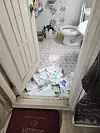 The torn remnants of Korean-language study materials used by the Bangladeshi employee after his manager allegedly went on a drunken rampage through the workers' dormitory on April 23. This photo was provided by the employee to the JoongAng Ilbo. [JOONGANG ILBO]