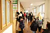 Prospective first graders and their parents look around first-grade classrooms at Changsin Elementary School in Busan on Jan. 6 during orientation. [YONHAP]