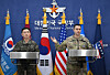 Col. Jang Do-young, left, public affairs director of Korea's Joint Chiefs of Staff, and U.S. Army Col. Ryan Donald, public affairs director of the United Nations Command, Combined Forces Command, and United States Forces Korea, pose for a photo during a media briefing at the Ministry of National Defense in central Seoul on Feb. 25. [AP/YONHAP]