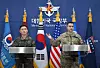 Col. Jang Do-young, left, public affairs director of Korea's Joint Chiefs of Staff, and U.S. Army Col. Ryan Donald, public affairs director of the United Nations Command, Combined Forces Command, and United States Forces Korea, pose for a photo during a media briefing at the Ministry of National Defense in central Seoul on Feb. 25. [AP/YONHAP]