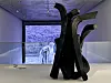 A 'Brushstroke' sculpture, front, by the artist Lee Bae and a video clip of him farming at his hometown, Cheongdo, North Gyeongsang, are on display at his solo show 'En attendant: Waiting' at Museum SAN in Wonju, Gangwon, on April 6. [LEE JIAN]