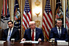 U.S. President Donald Trump, center, sitting next to Secretary of State Marco Rubio, left, and Defense Secretary Pete Hegseth, holds a cabinet meeting at the White House in Washington on March 26. [REUTERS/YONHAP]