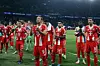 Bayern Munich's English forward Harry Kane applauds his supporters with teammates at the end of the UEFA Champions League semi-final first leg football match between Paris Saint-Germain and Bayern Munich at the Parc des Princes in Paris on April 28. [AFP/YONHAP]