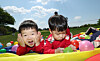 Children play at a bouncy house in Gunpo County, Gyeonggi, on May 4. [NEWS1]
