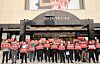 Members of three May 18 Democratization Movement organizations hold a rally in front of the main entrance of the Shinsegae Department Store in Gwangju's Seo District on May 22, condemning Starbucks Korea over its controversial 'Tank Day' marketing campaign. [NEWS1]