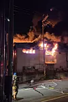Firefighters extinguish fire at a cardboard-box factory in Ansan, Gyeonggi on June 7.