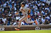 San Francisco Giants' Lee Jung-hoo scores on a Matt Chapman's sacrifice fly during the ninth inning of a baseball game against the Chicago Cubs in Chicago on June 6.
