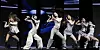 izna members dance onstage during a showcase performance at Blue Square in Seoul.