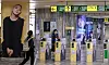 Subway station gates and pillars wrapped with large BTS Jimin and Jungkook images in Busan.