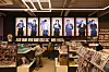 Visitors shop inside a K-pop related merch store in central Seoul on March 30.
