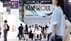 Visitors walk through the Kiaf Seoul 2025 art fair inside Coex in Seoul.
