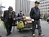 Older adults march in central Seoul to protest about basic pension in March 25, 2019.