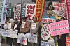 People stage a rally to eradicate politicians who stir up  regionalism in politics in an undated file photo.
