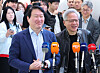 Chey Tae-won and Jensen Huang stand at microphones during a joint SK-Nvidia briefing in Seoul.