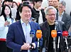 Chey Tae-won and Jensen Huang stand at microphones during a joint SK-Nvidia briefing in Seoul.