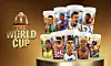 FIFA World Cup cups with player photos arranged on a display stand.