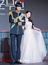 Actors IU and Byeon Woo-seok pose for photos during a press conference for the MBC series “Perfect Crown″ at the Josun Palace Hotel in Gangnam District, southern Seoul, on April 6. [DANIELA GONZALEZ PEREZ]