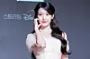 Singer and actor IU poses for photos during a press conference for the MBC series “Perfect Crown″ at the Josun Palace Hotel in Gangnam District, southern Seoul, on April 6. [DANIELA GONZALEZ PEREZ]