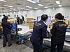 Customs authorities examine packages [KOREA CUSTOMS SERVICE]