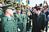 President Lee Jae Myung, right, encourages newly commissioned officers during an integrated commissioning ceremony at the Gyeryongdae parade ground in Gyeryong, South Chungcheong, on Feb. 20. [YONHAP]