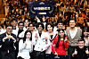 First lady Kim Hea Kyung, center right, and JYP founder Park Jin-young, back row second from right, co-chair of the Presidential Committee on Popular Culture Exchange, pose for a commemorative photo with the winners of ″K-Dream Stage,″ a K-pop competition in India, at Yashobhoomi Convention Center in New Delhi on April 20. [JOINT PRESS CORPS]